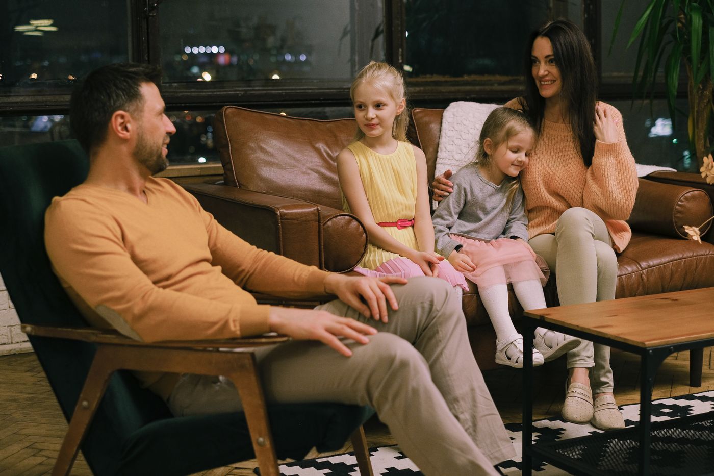 Family relaxing safely at home in the evening