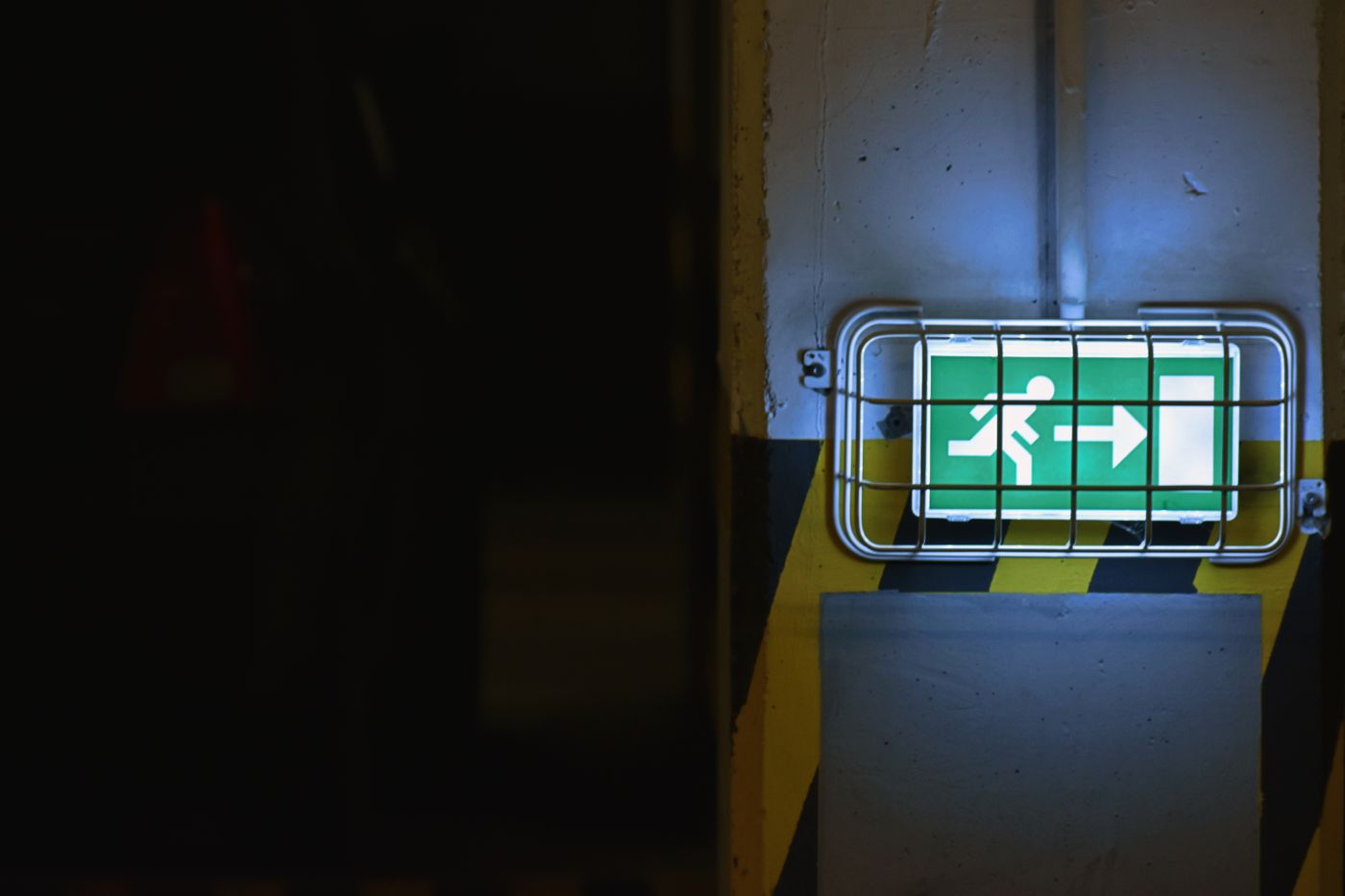 Illuminated emergency exit sign