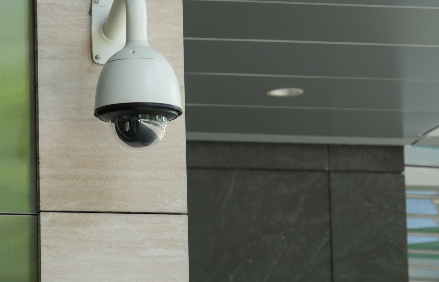 Turret security camera on a modern building